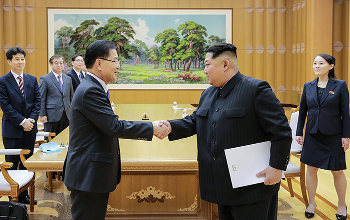 Chief of the National Security Office Chung Eui-yong (left) and North Korean leader Kim Jong-un shake hands after Chung delivered a signed letter to Kim from President Moon Jae-in, in the main building of the Workers Party of Korea in Pyongyang on March 5.